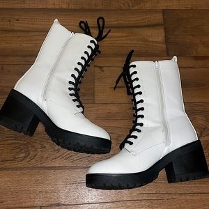 Woman’s Lace-Up Heeled Boots